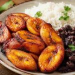 Best maduros fritos near me - caramelized fried sweet plantains with rice and beans