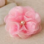 Handmade pink trastullami fabric flower with pearl center